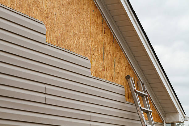 Professional Siding Repair technician working in Hilltown, PA